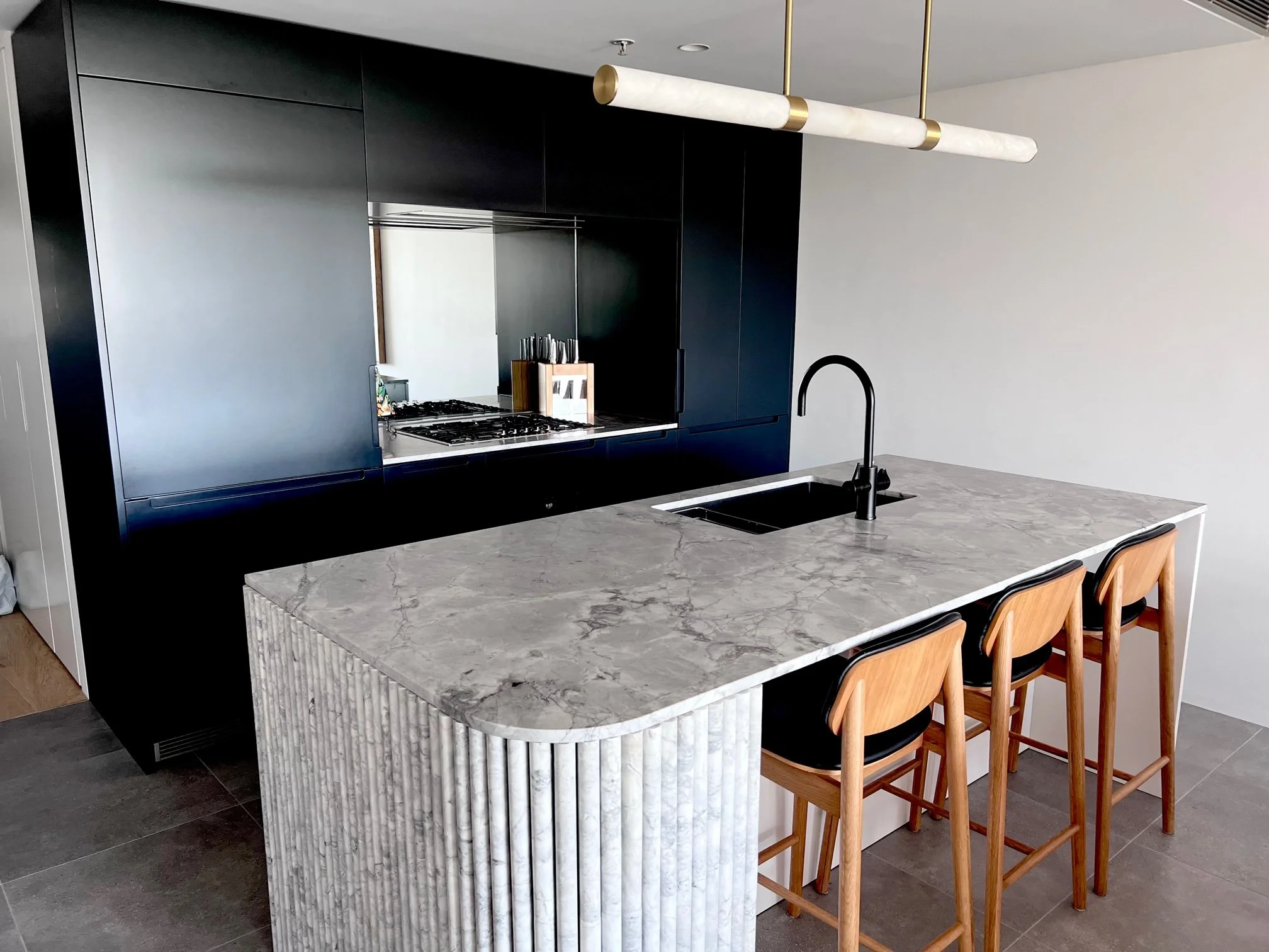 Kitchen design with fluted stone