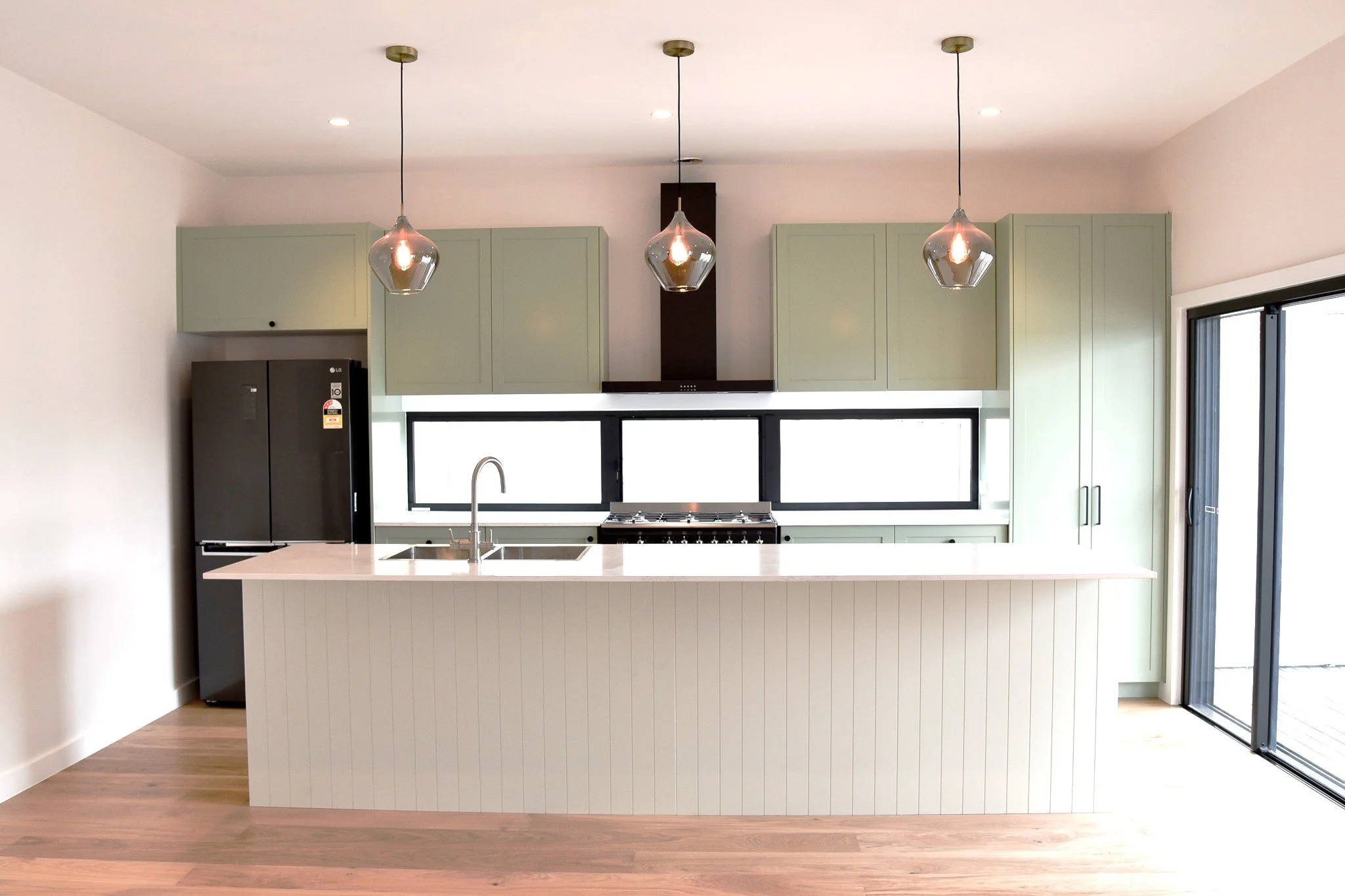 Green kitchen with vj panelling