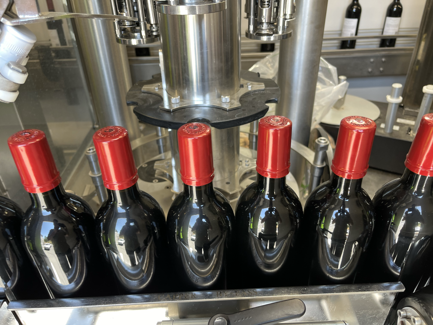 Wine moving through a bottling line at a California winery