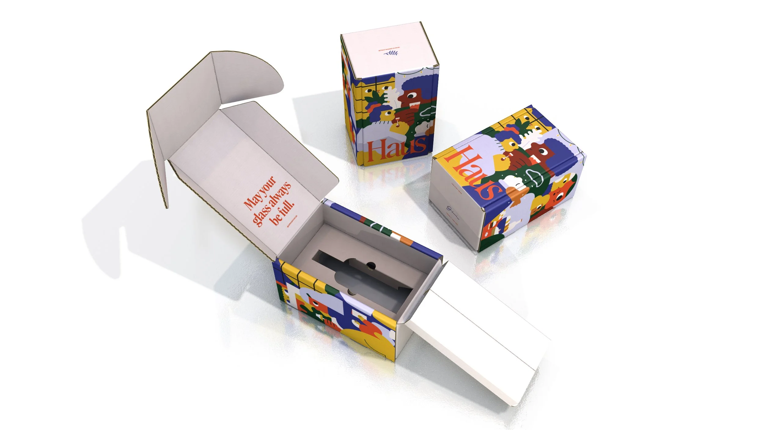 Colorful cardboard boxes with artistic illustrations, one of which is open and has a message inside that reads, 'May Your glass always be full.'