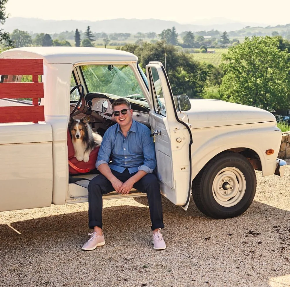 Micah Wirth with his dog in Sonoma County wine country
