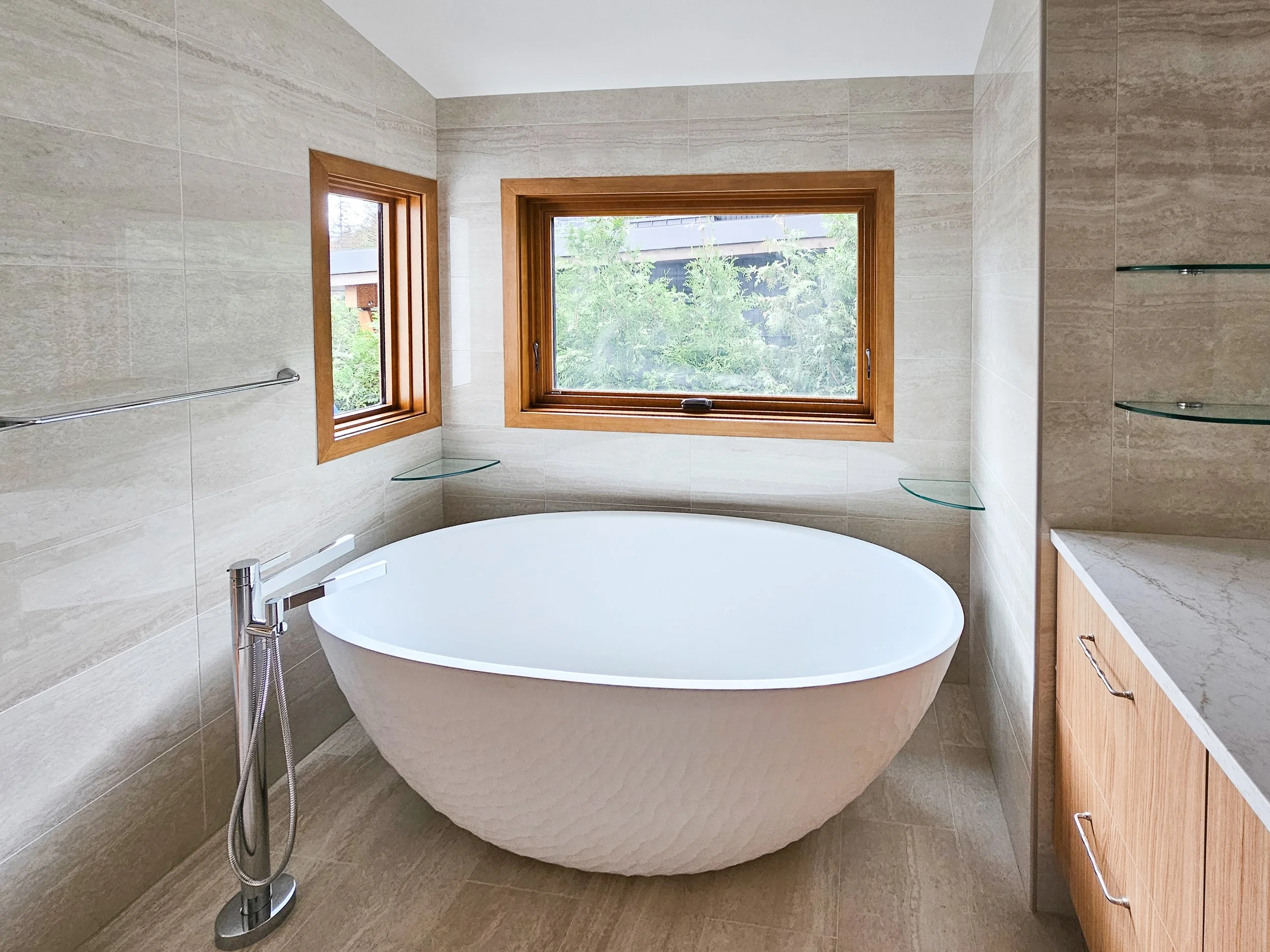 Alpine Way ski chalet transformed into a family mountain home with custom wood and copper windows by Golden Spruce.