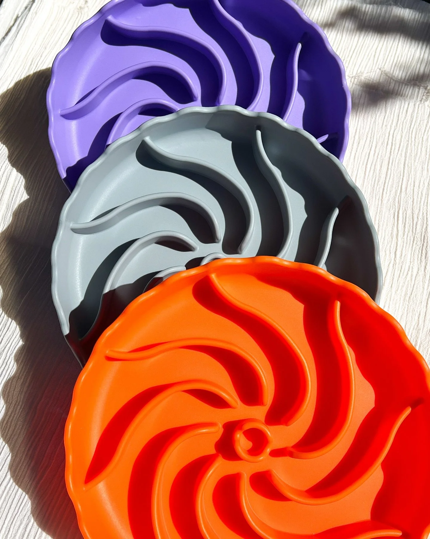 the two newest colors of our swirl bowl are in &amp; ready to ship (along with all fall silicone molds)! 🧡
&bull;
friendly reminder that we have a 1-3 day turnaround time for enrichment based orders :) 
&bull;
#viviscollection #swirlbowl #slowfeeder