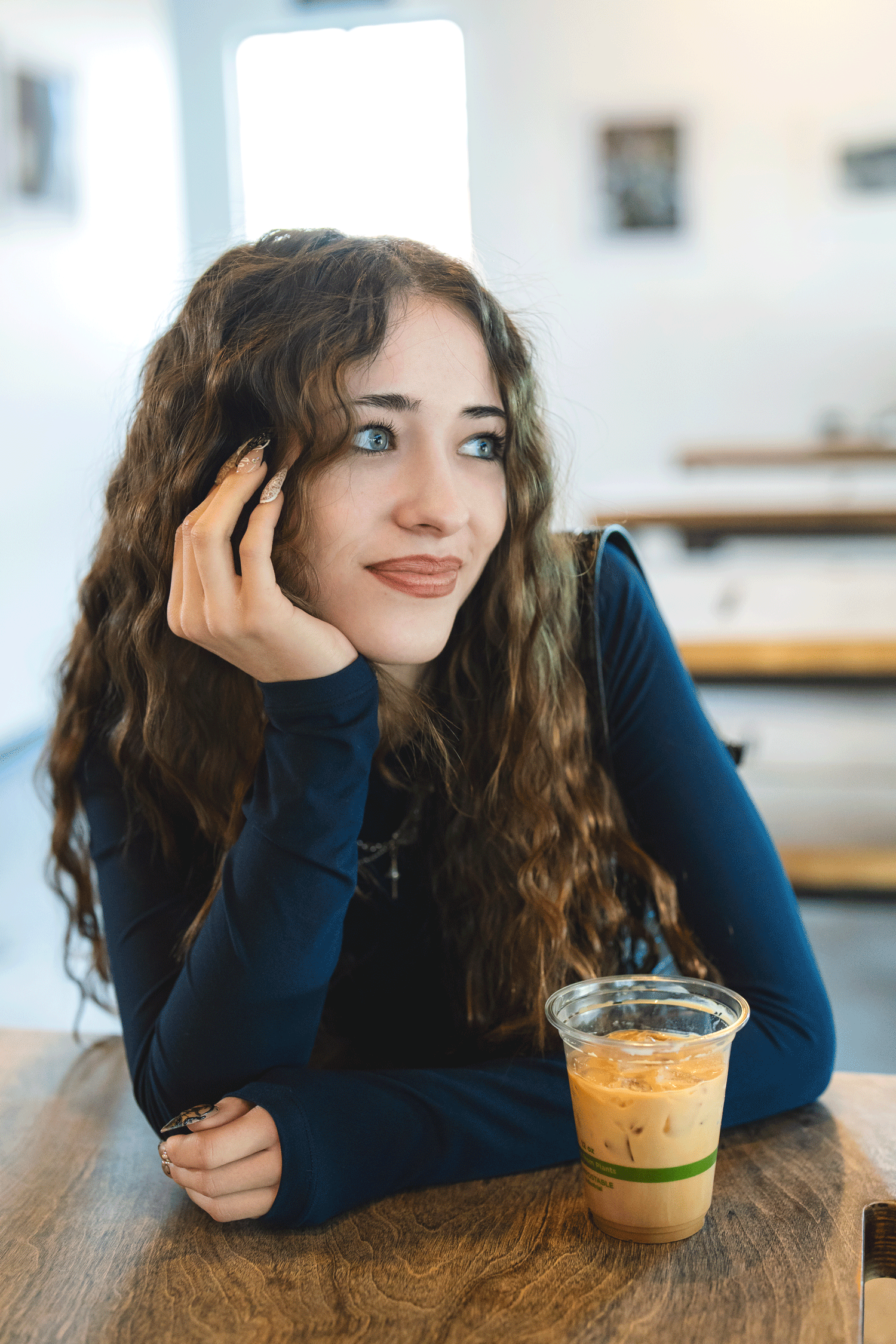 Senior in coffee shop