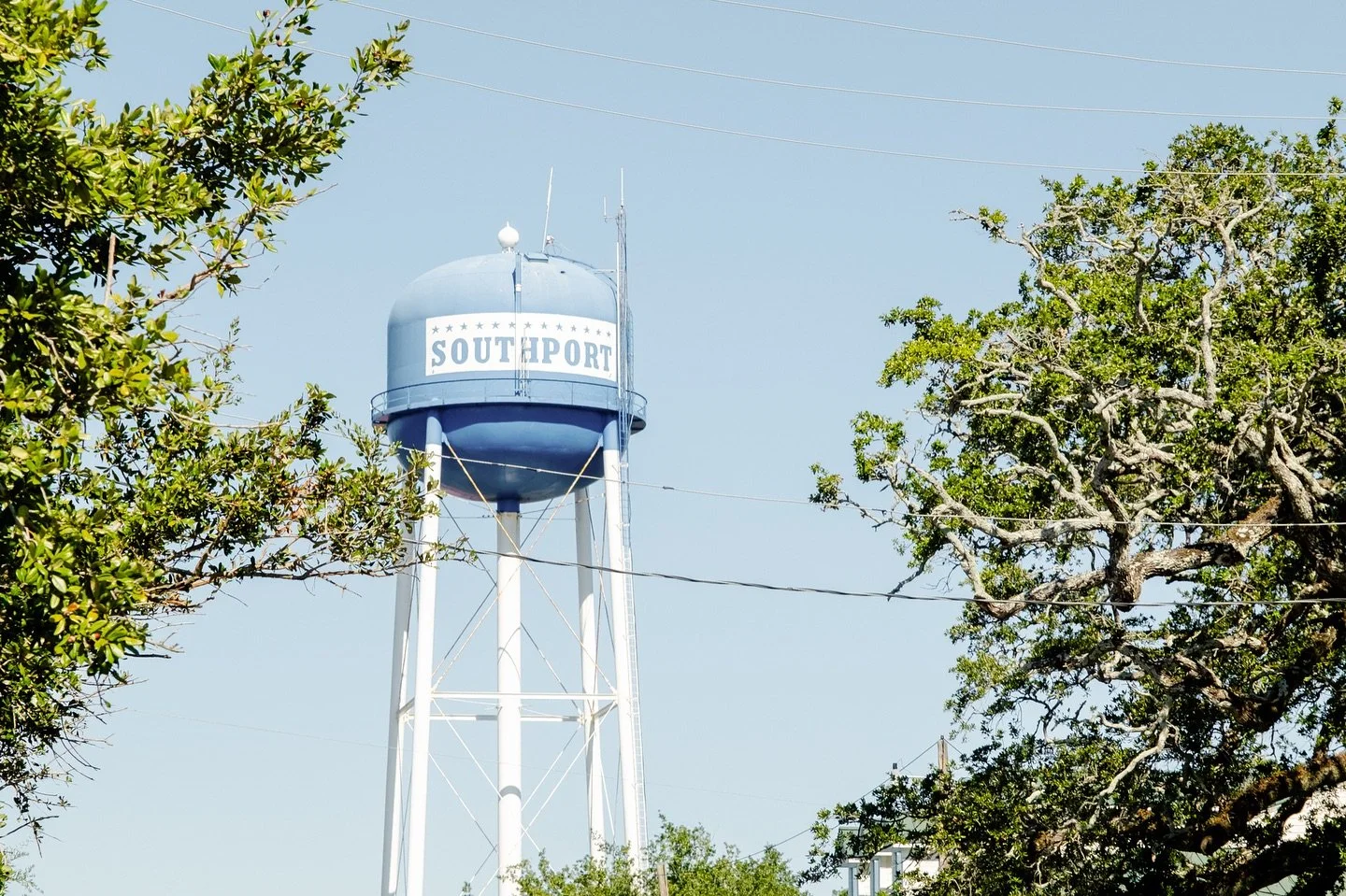 Our hearts are heavy for a place we love so dearly 🤍 Sending all of our love and prayers to the victims, their families, and everyone who was affected by this heartbreaking tragedy in Southport. #southportstrong #southportnc #prayforsouthport