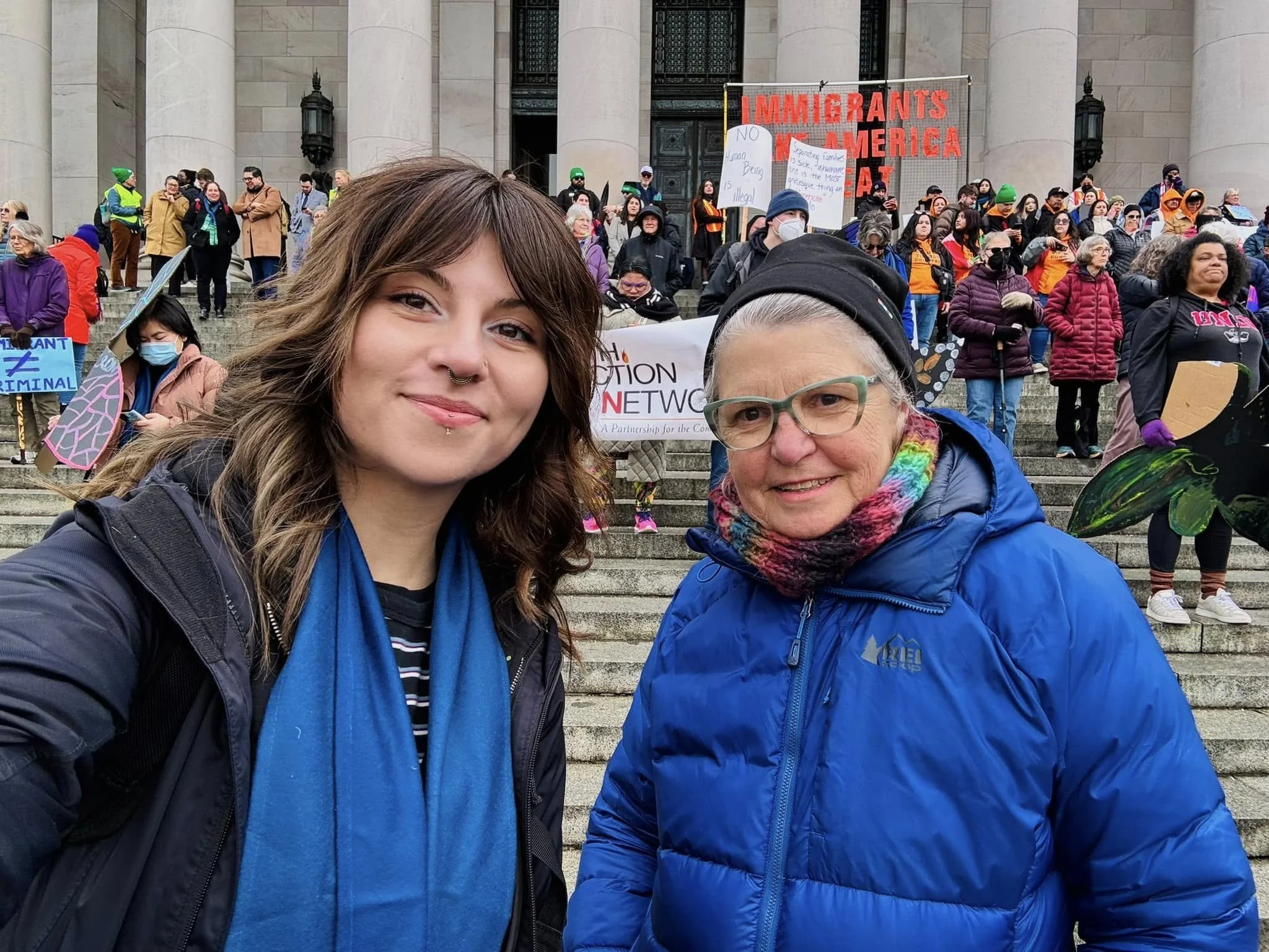 Commissioner Emily Clouse with constituent at a rally on the Capitol Steps