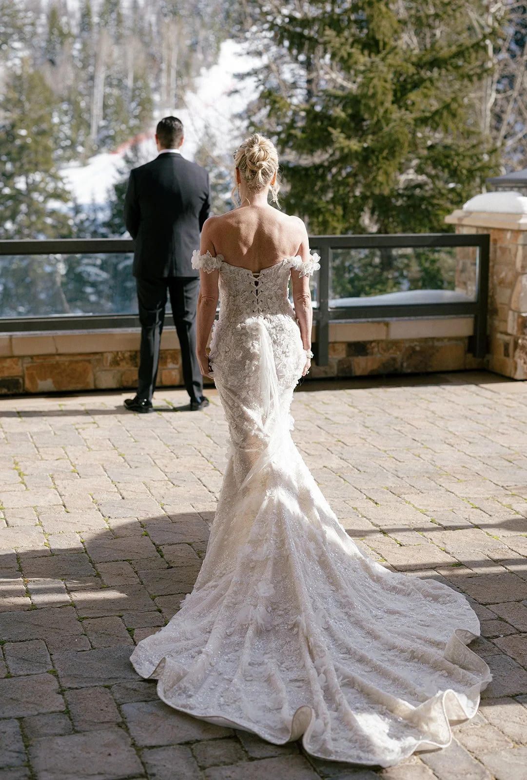  Bride and groom sharing their first dance under twinkling lights in a clear tent at St. Regis Deer Valley. 