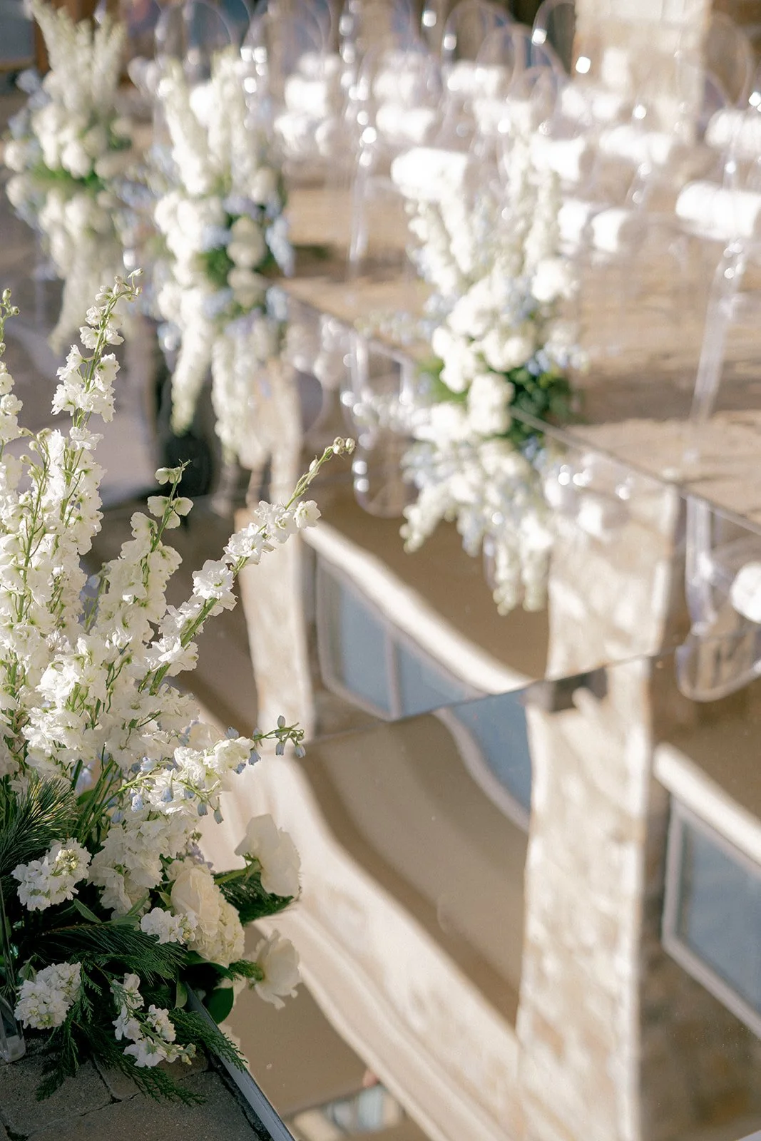  Gray and white winter wedding decor at Deer Valley with soft florals, elegant table settings, and a muted seasonal color palette 