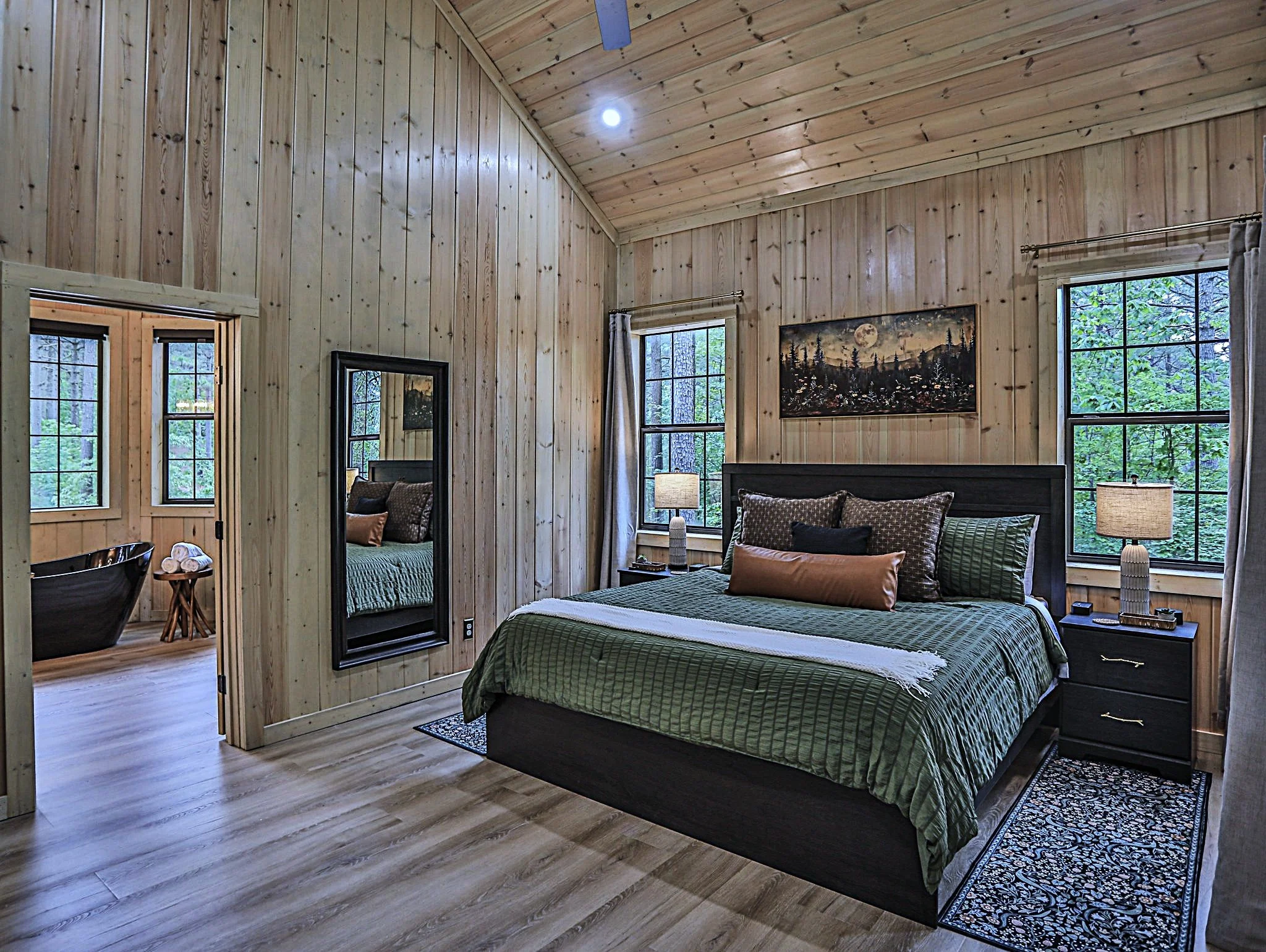 The king bed in the primary suite.