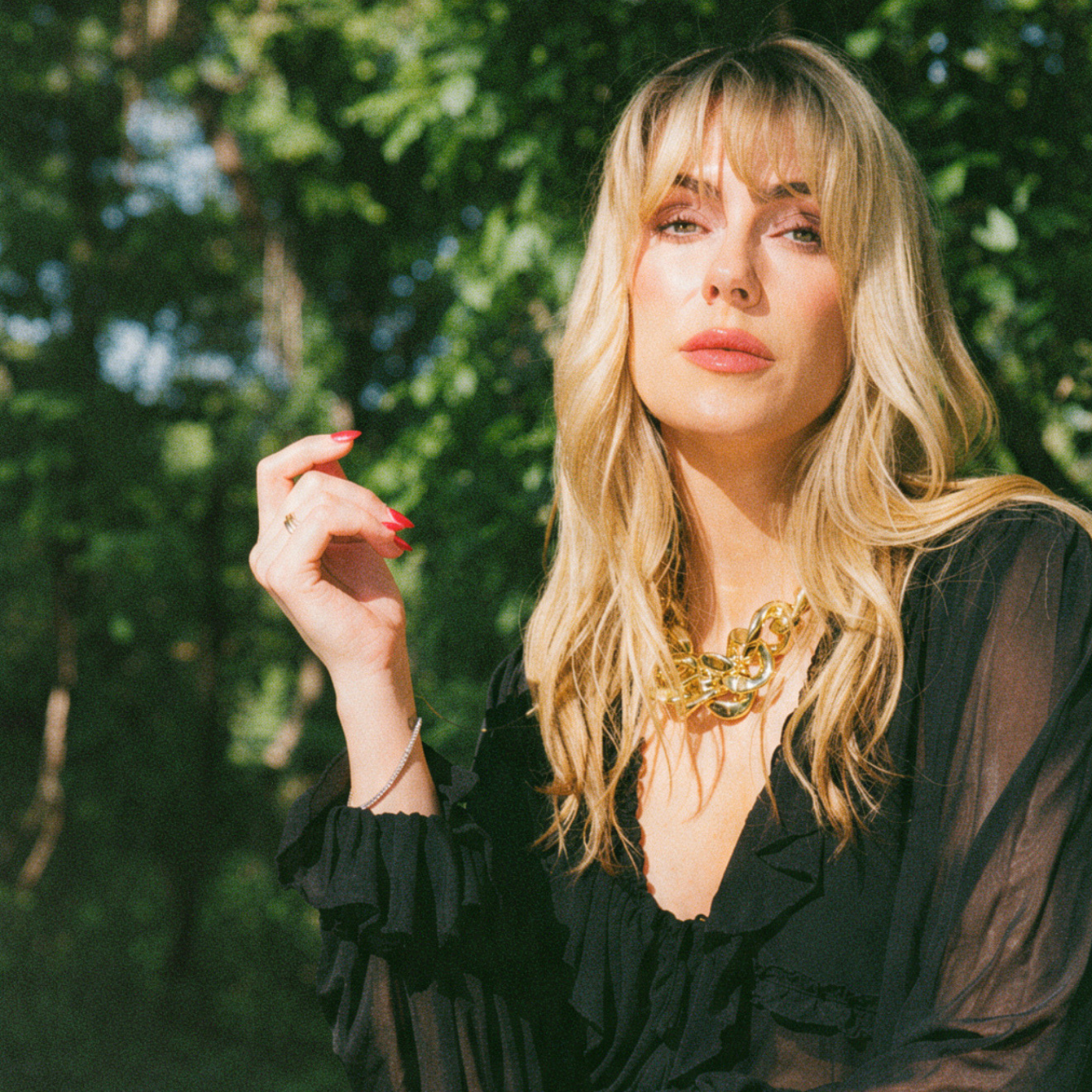 NoelleToland_black1400x1400.png