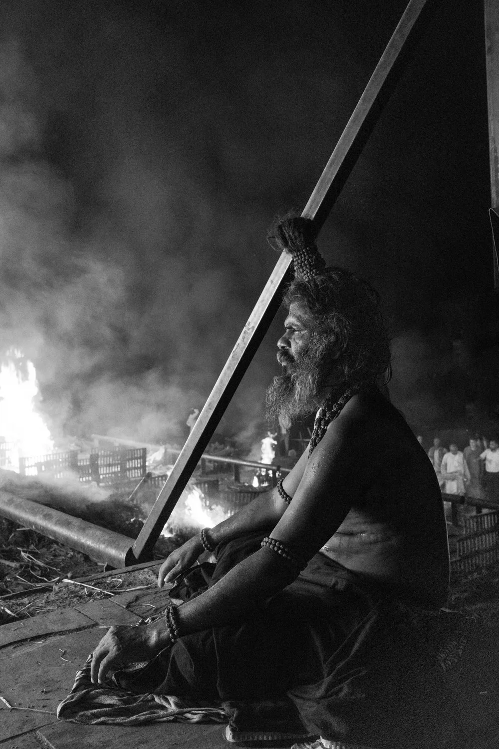 HOLY AGHORI RENUNCIATE MEDITATES AMIDST CREMATIONS – VARANASI, INDIA 2024