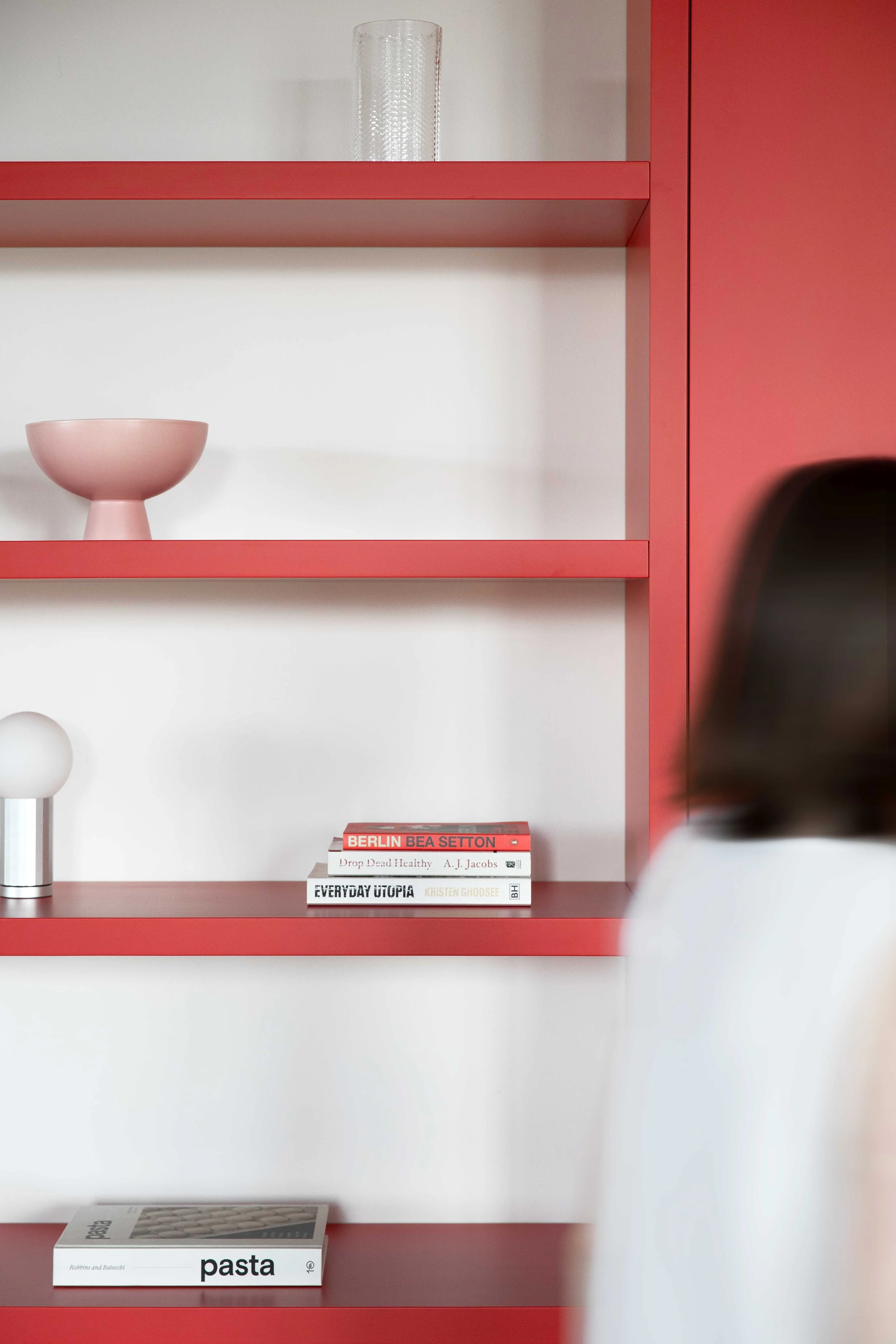 A custom built-in shelf in Farrow & Ball Romesco, Kreuzberg Berlin