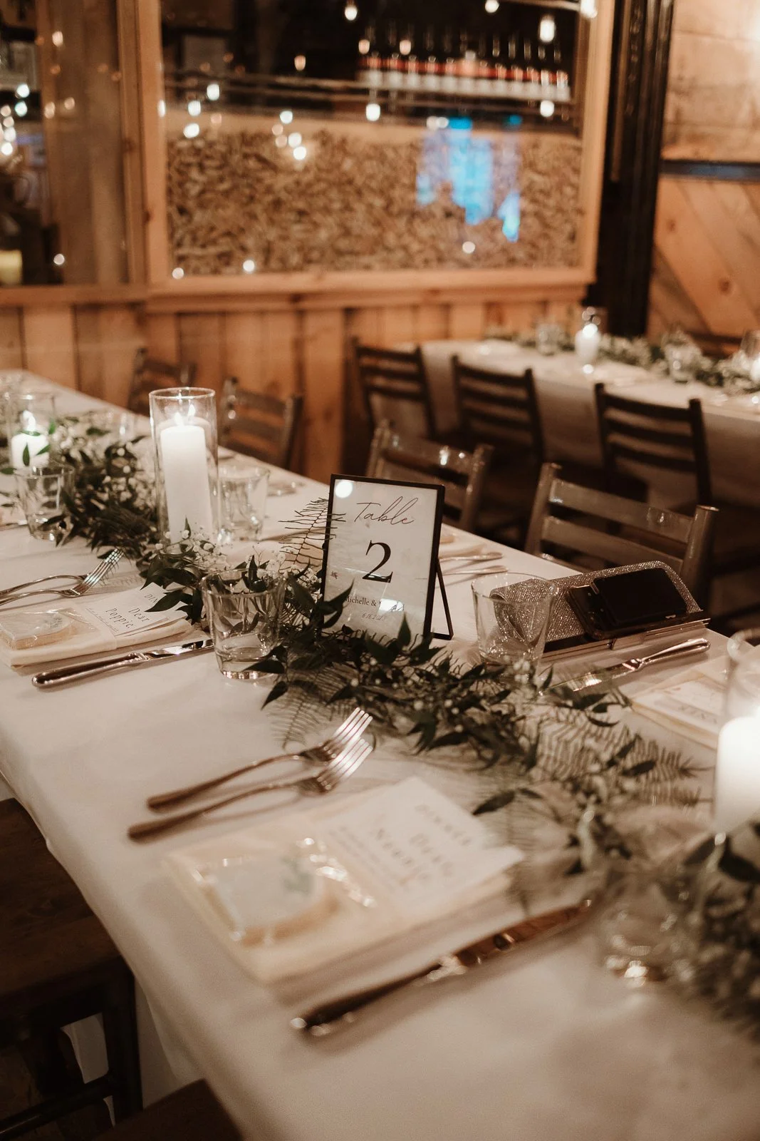 The Posie Peddler had beautifully delicate garland and florals to accent the built-in beauty at Forno.