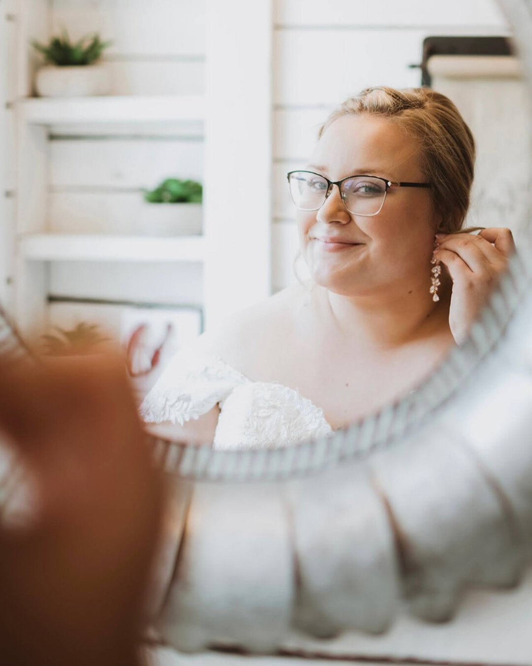 This glowing bride is putting on the final touches before taking that life-changing walk down the aisle.