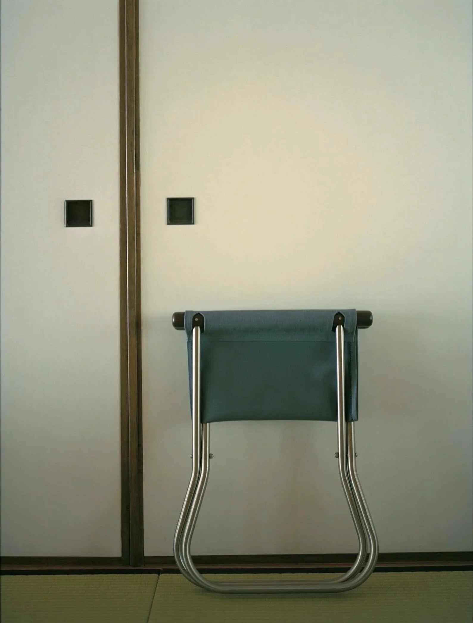 Nychair X Stool in grey &amp; dark wood.
Simple. Lightweight. Timeless.