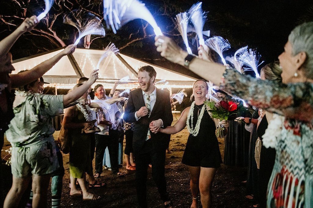 A wedding exit with lightsticks? YES PLEASE!

Planning+Coordination: @fredandkateevents
Venue@kualoaranch
Hair+make-up: @revealhairandmakeup
Photo: @derekwongphotography
Catering: @kenekeswaimanalo
Florist: @wngchaiwaii
Rentals: @eventaccents
DJ: @dj