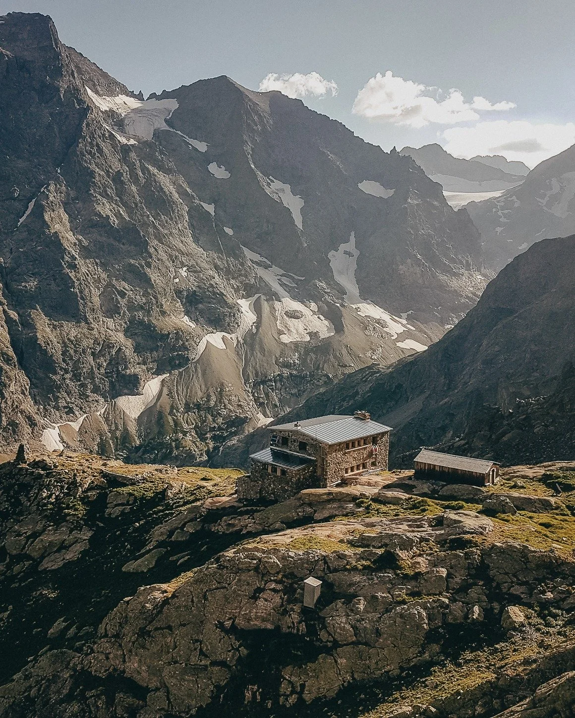 Longing for the refuge. Always a landmark along the Pilgrimage routes. A place high in the mountains where we arrive after a long day on the trails. When darkness falls, it offers shelter, warmth, and a meal waiting on the shared table.

In the upcom