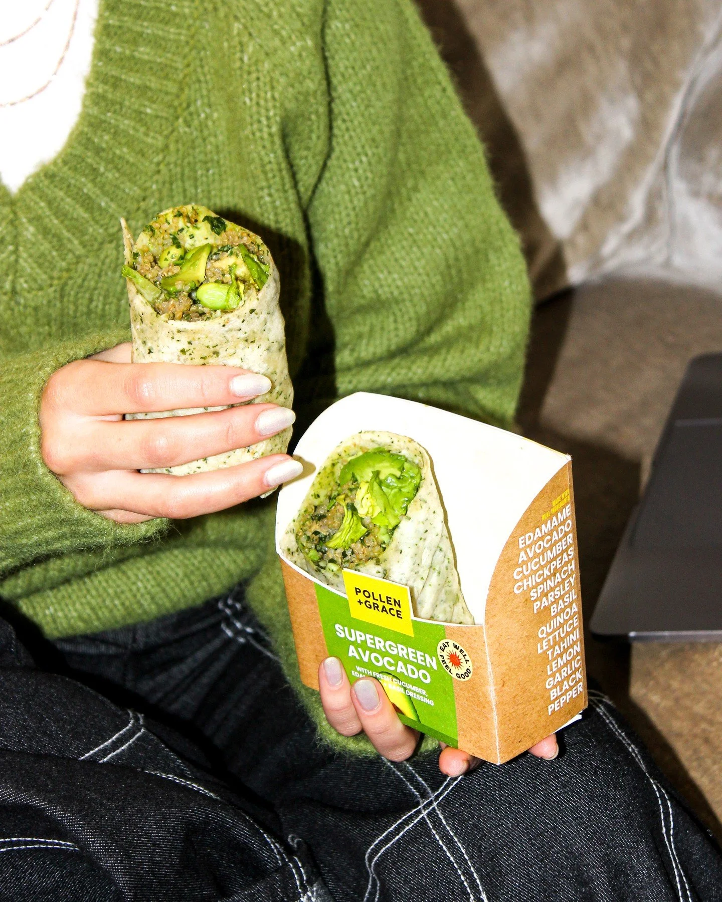 Lunch sorted 💚⁠
⁠
Supergreen Avocado Wrap in hand, laptop to the side, and a moment to enjoy 🌱
