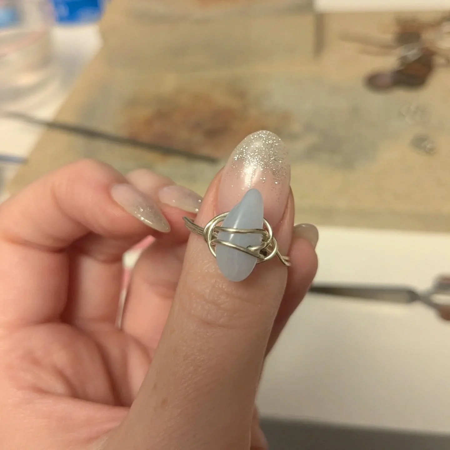 Gave this ring a little silver upgrade. Swapping out the old metal for sterling silver and giving it a sturdier design.

#silverring #wirewrappedring #silverjewellery #upgradingjewellery #scottishmaker #smallbusiness