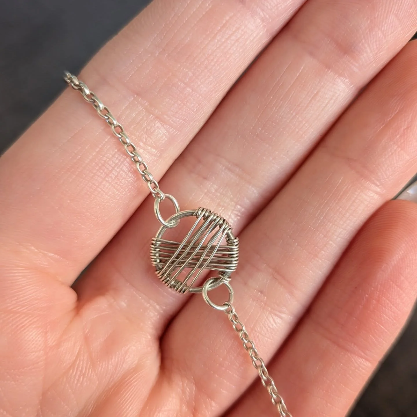 Highlighting this wee necklace today! I've been wearing it every day for a while now and it's still just as shiny as when it was first made. This is one reason why I love working with silver!

Crossover necklace is available on my website 

Link in b