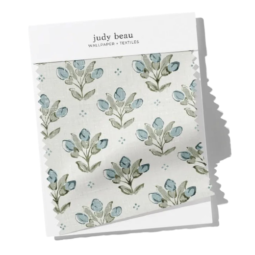 Sample of wallpaper with a floral pattern featuring blue and gray leaves from Judy Beau.
