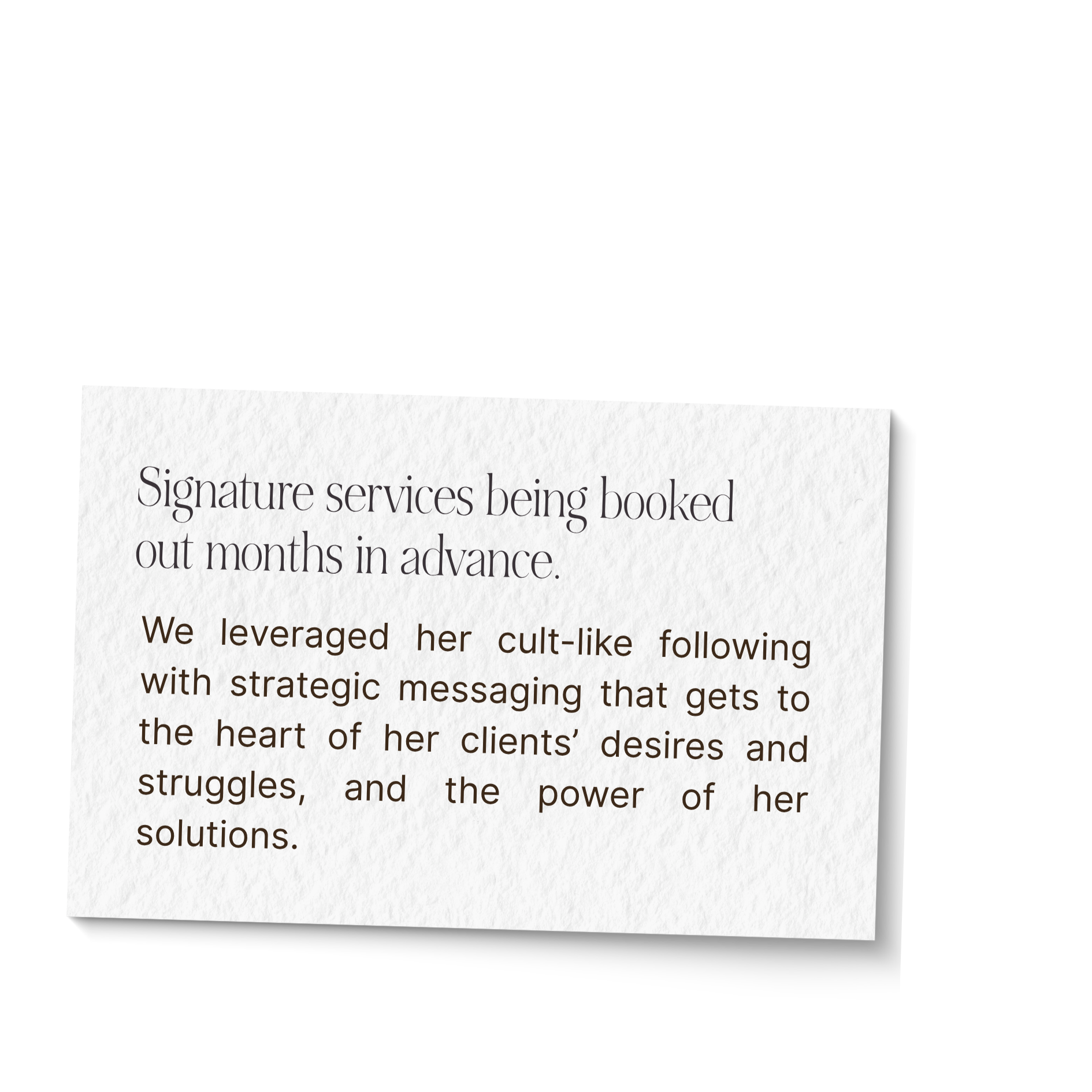 Close-up of a newspaper article about signature services being booked out months in advance, with part of the text visible on textured paper.