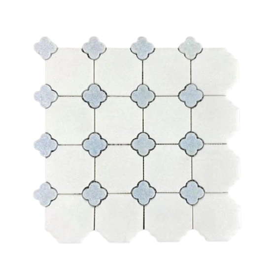 A 4x4 grid of white tiles with decorative blue and white flower-shaped tiles at the intersections.