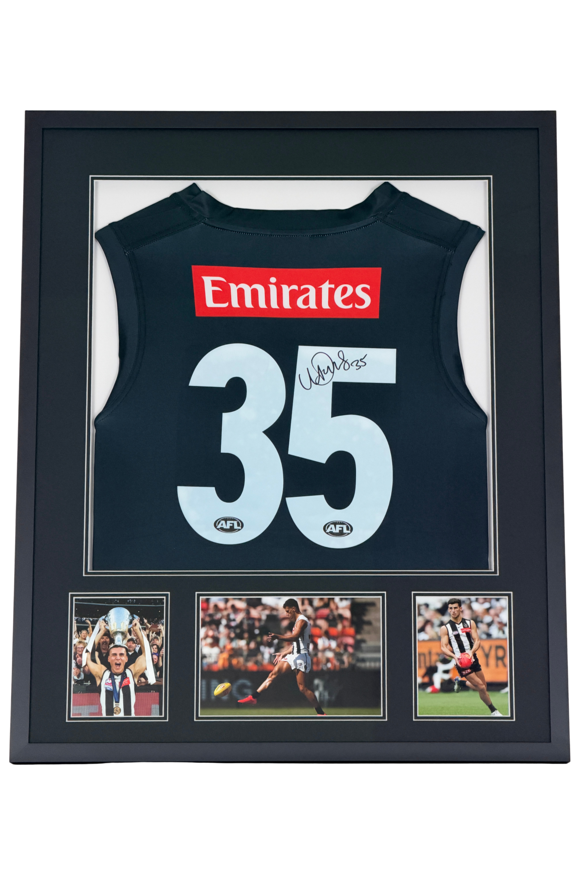 Nick Daicos signed Collingwood Magpies AFL replica jersey in a display frame