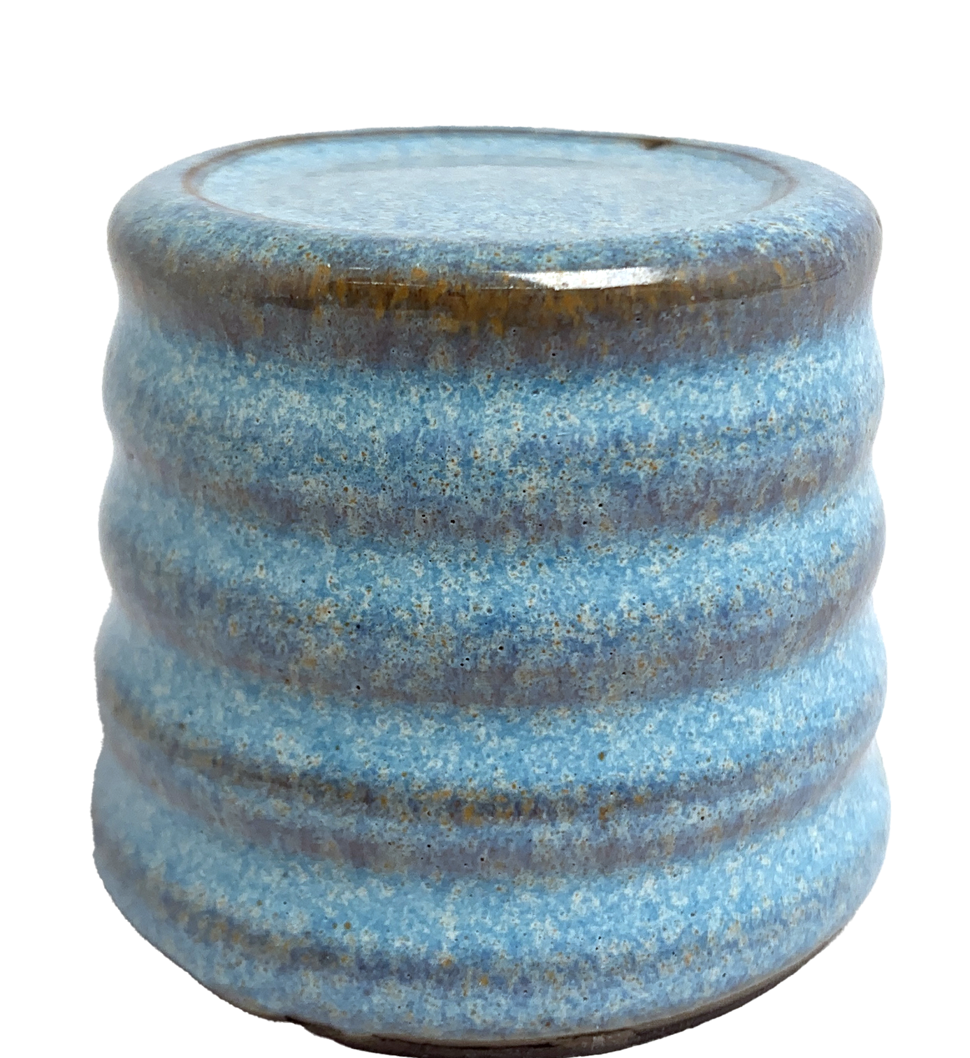 Close-up of glazed ceramic object. It used as an example to indicate the appearance of the glaze. The glaze is light blue