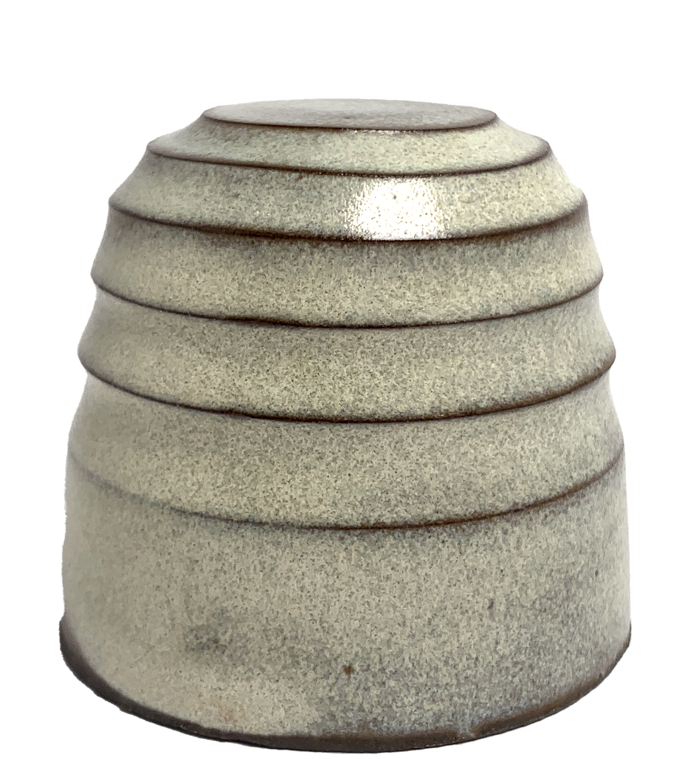 Close-up of glazed ceramic object. It used as an example to indicate the appearance of the glaze. The glaze is light green