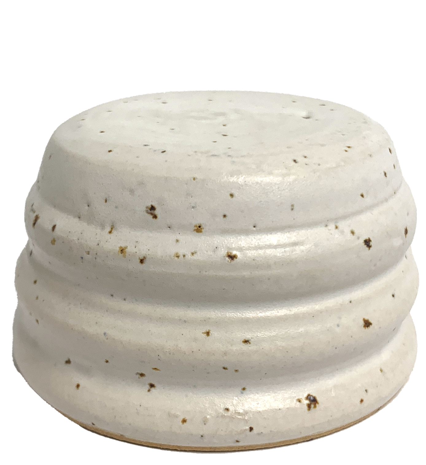 Close-up of glazed ceramic object. It used as an example to indicate the appearance of the glaze. The glaze is white