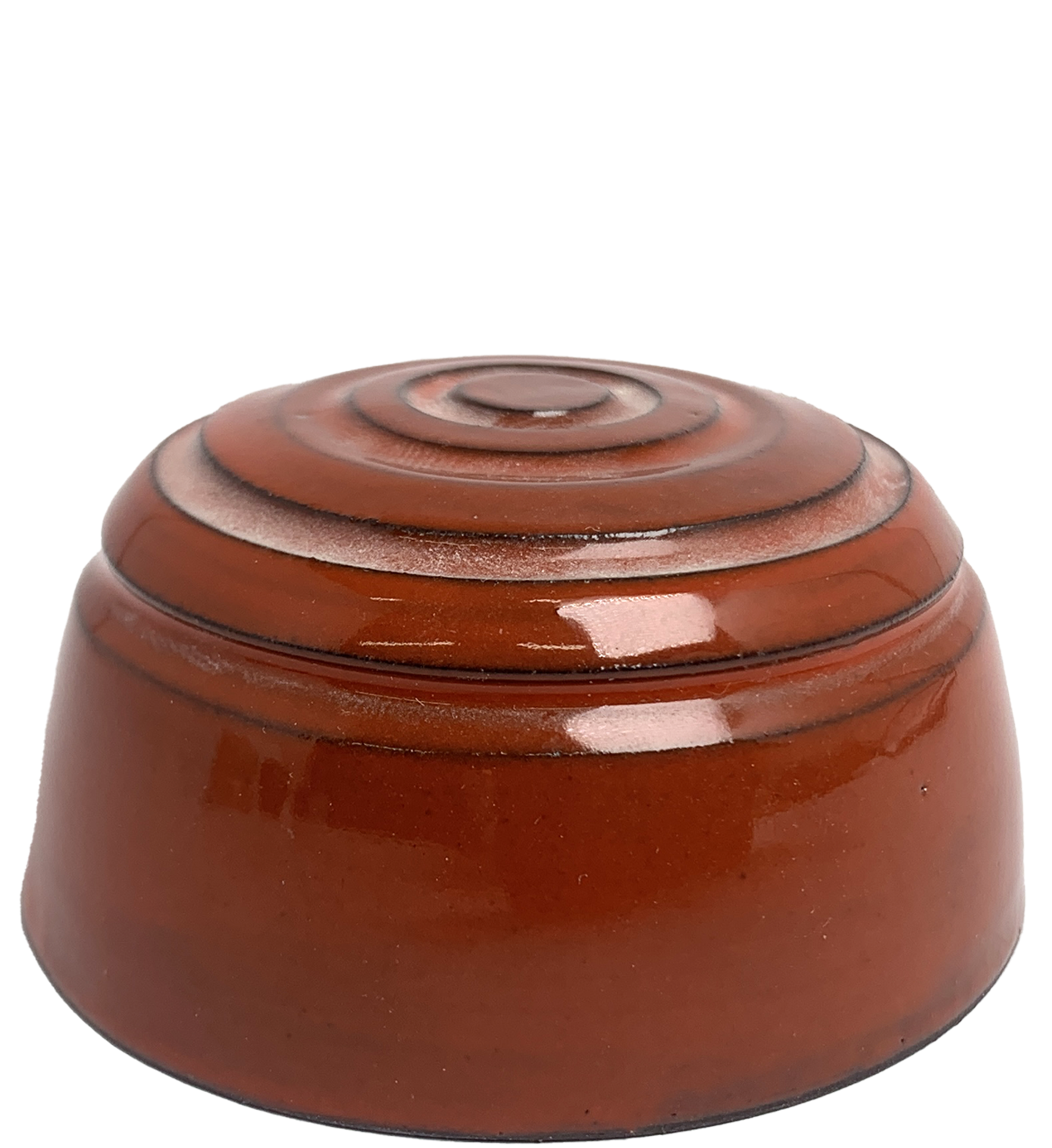Close-up of glazed ceramic object. It used as an example to indicate the appearance of the glaze. The glaze is red
