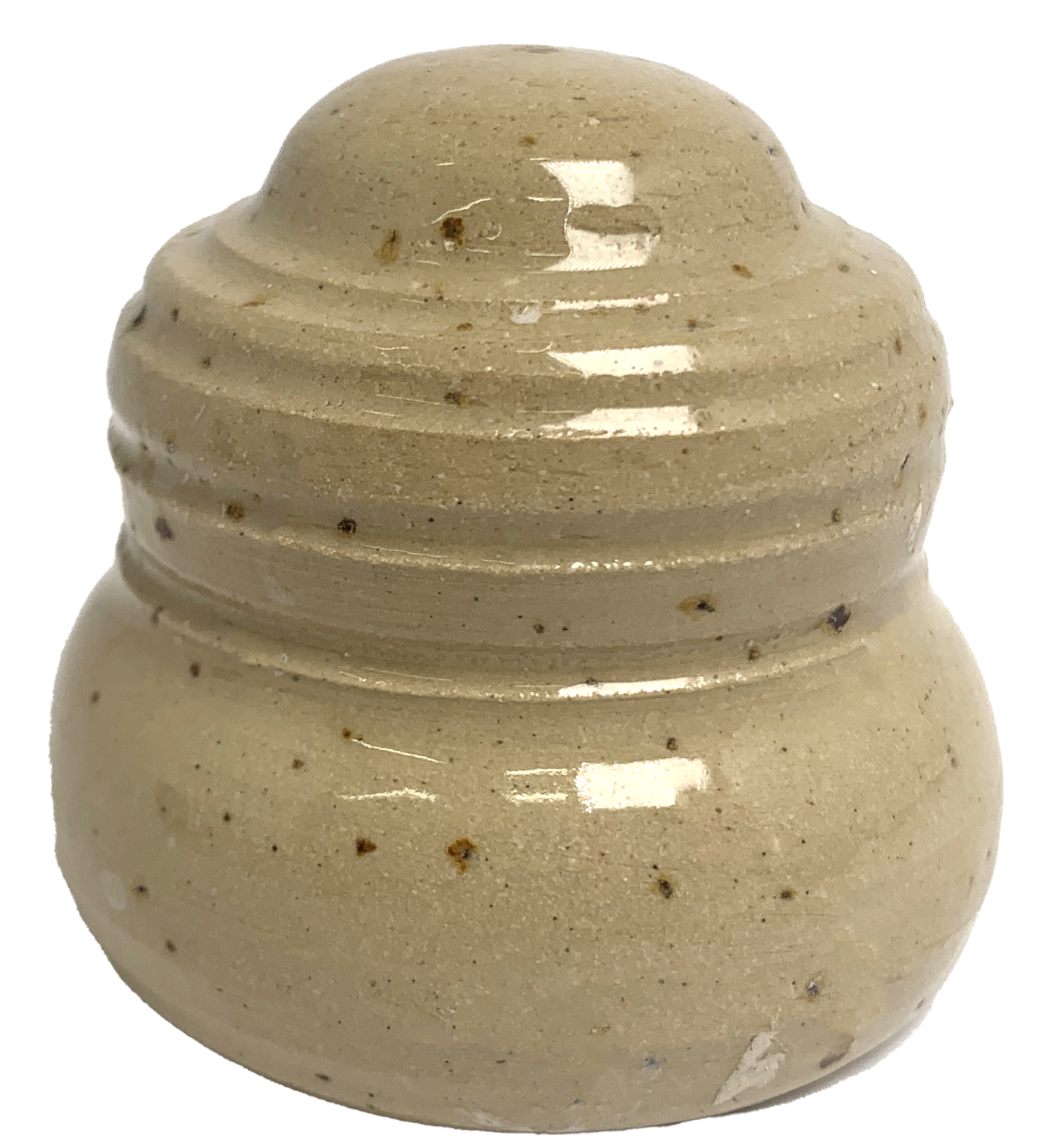 Close-up of glazed ceramic object. It used as an example to indicate the appearance of the glaze. The glaze is beige