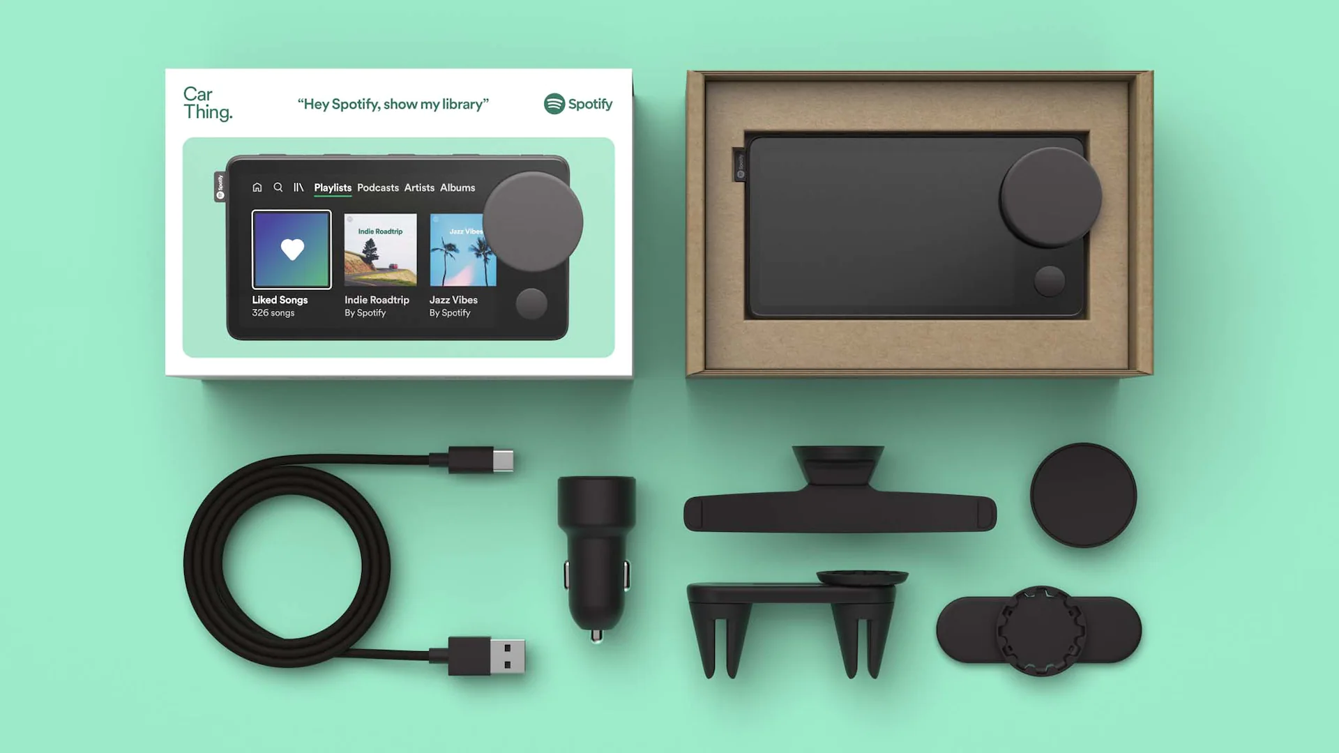 A portable speaker and accessories including a charging cable, a car charger adapter, a mount, and a carrying case, all displayed on a mint green background with the packaging box showing a smartphone interface with Spotify app.