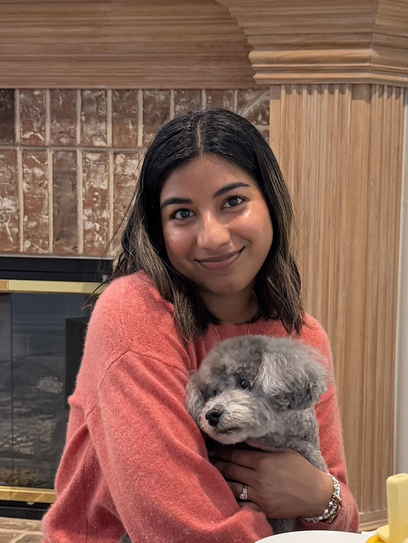 Headshot of woman wth poodle