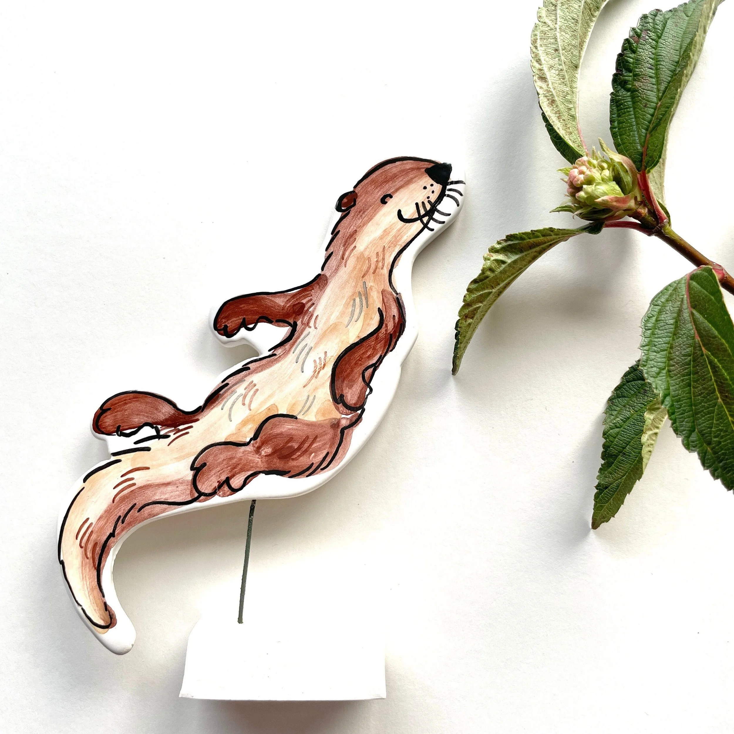 Otter pottery ornament