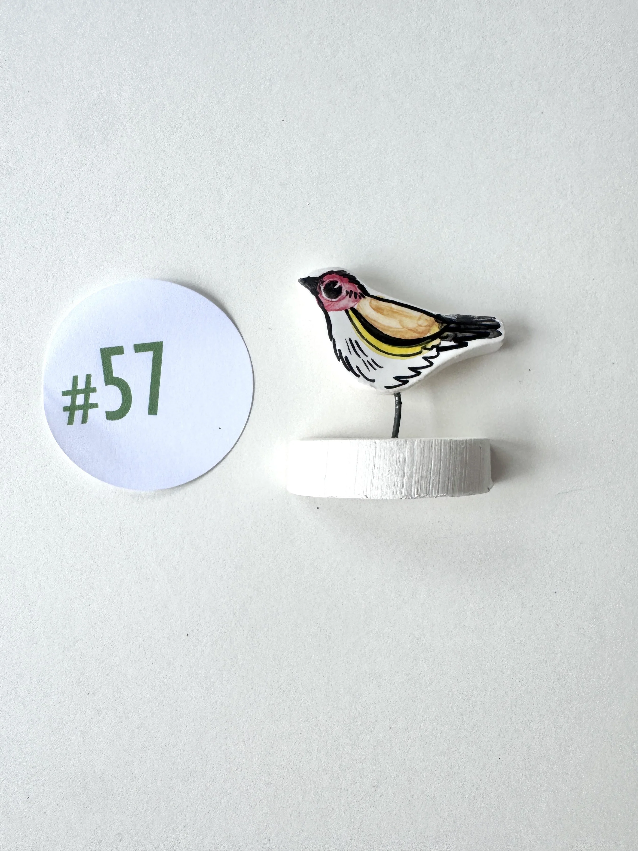 Tiny Goldfinch pottery ornament #57