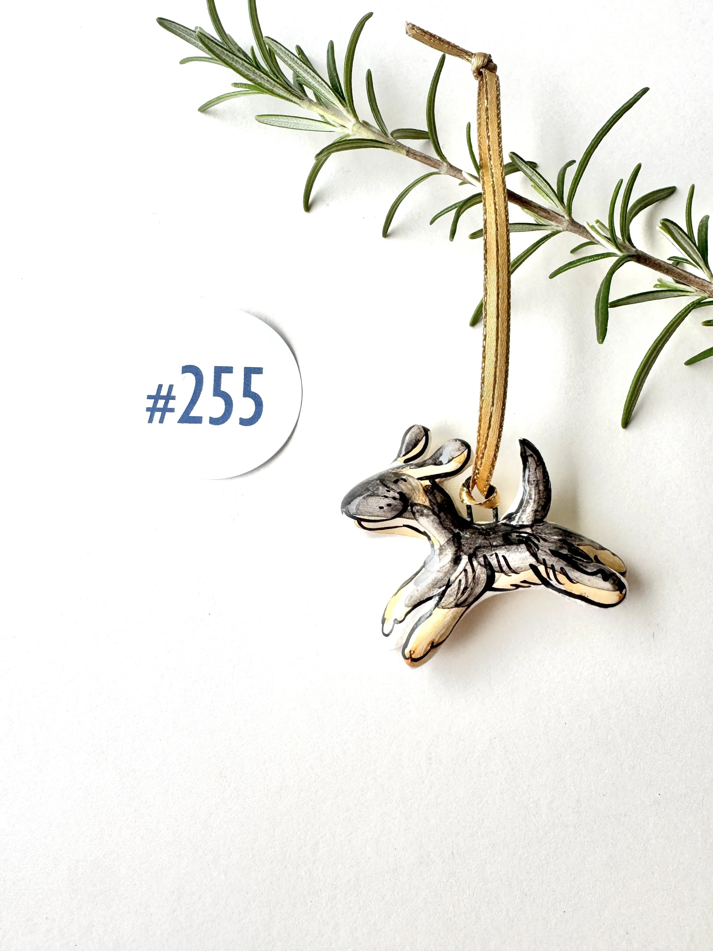 #255 Tiny Black and Tan Dog