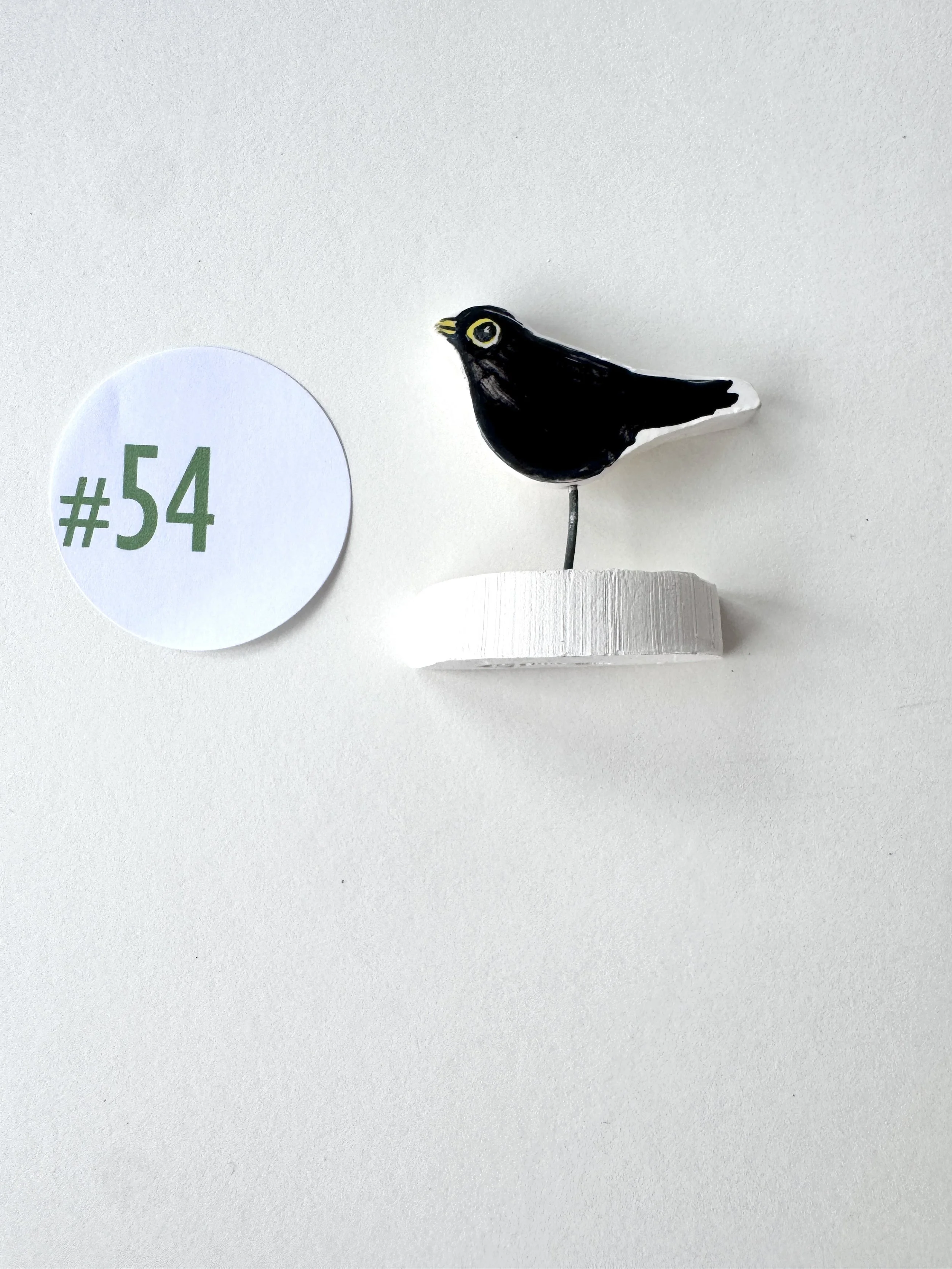 Tiny Blackbird pottery ornament #54