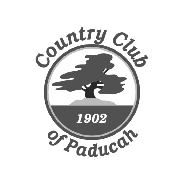 Logo of the Country Club of Paduacan featuring a tree, with the year 1902, in gray and white.