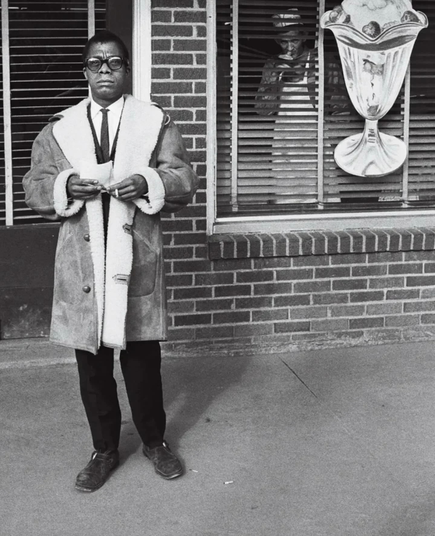 Did you know the iconic James Baldwin once visited Durham?! Here he is in front of the segregated Royal Ice Cream Parlor in 1963, 6 years after the sit-in protest that progressed the Civil Rights movement in NC and beyond. This photograph says SO muc