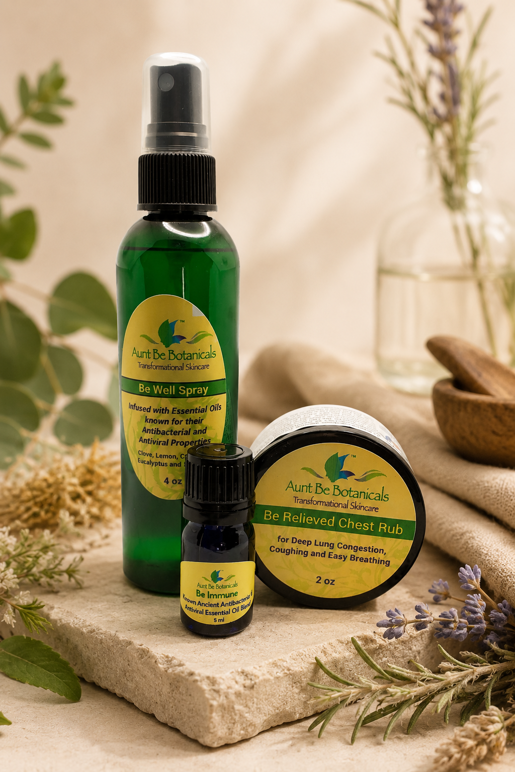 A three-piece botanical wellness-support set featuring Be Immune Drops, Be Relieved Chest Rub, and Be Well Botanical Defense Spray for everyday routines, aromatic comfort, and freshening your space.
