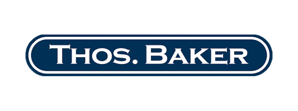 Thos. Baker logo in blue and white with an oval shape.