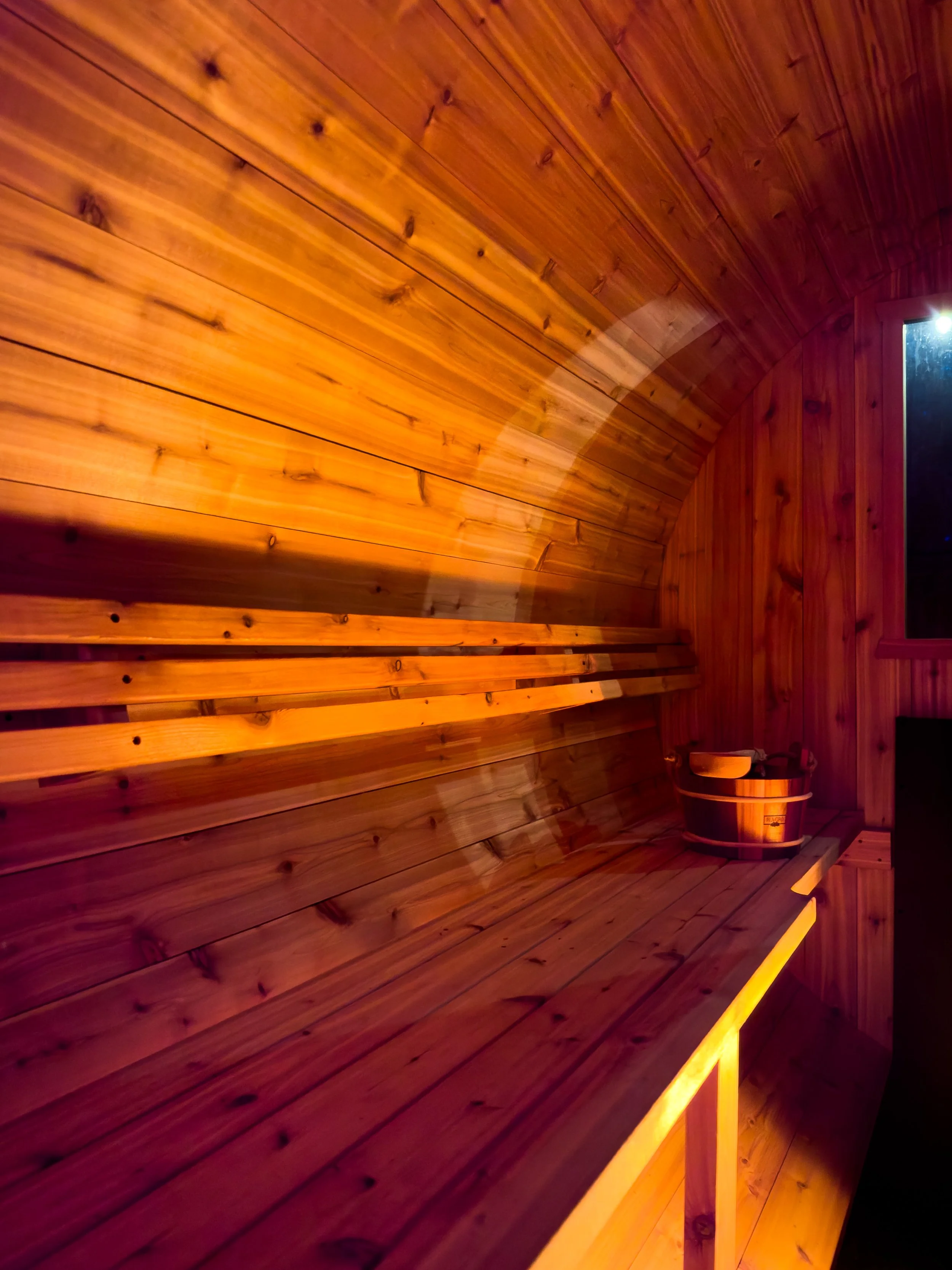 the inside glow of sauna at night