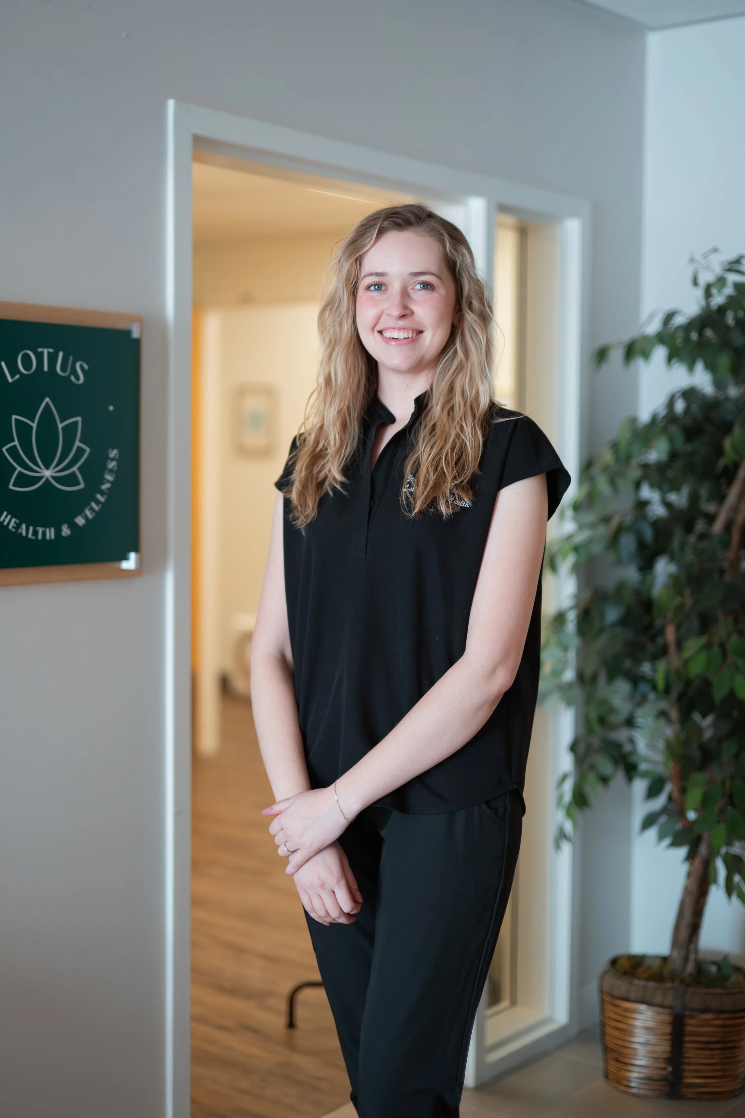 Dr. Lauren Randall, a pelvic health physical therapist and athletic trainer in Avon, CT at Lotus Pelvic Health & Wellness