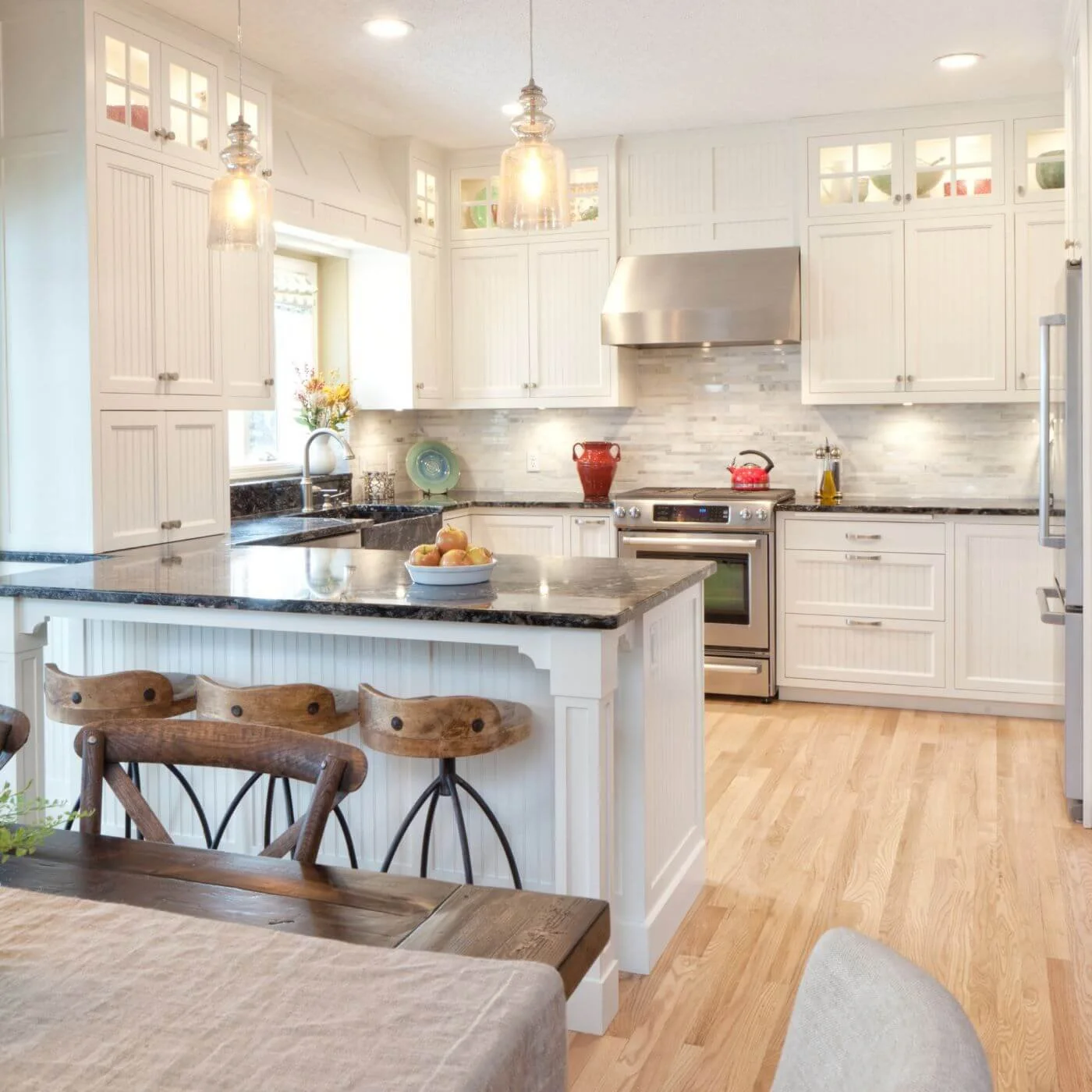 Bright, organized kitchen with clear countertops and a calm, functional layout.