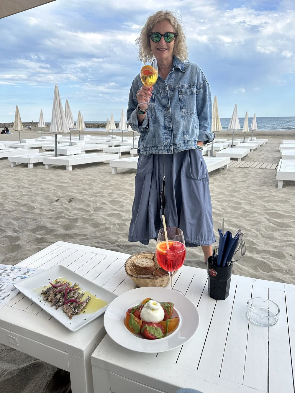 me on the beach with cocktail.jpg