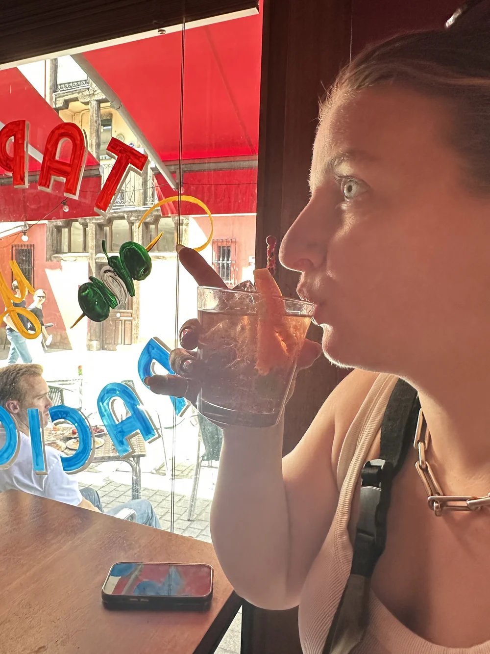 Sam drinking in Madrid.jpg