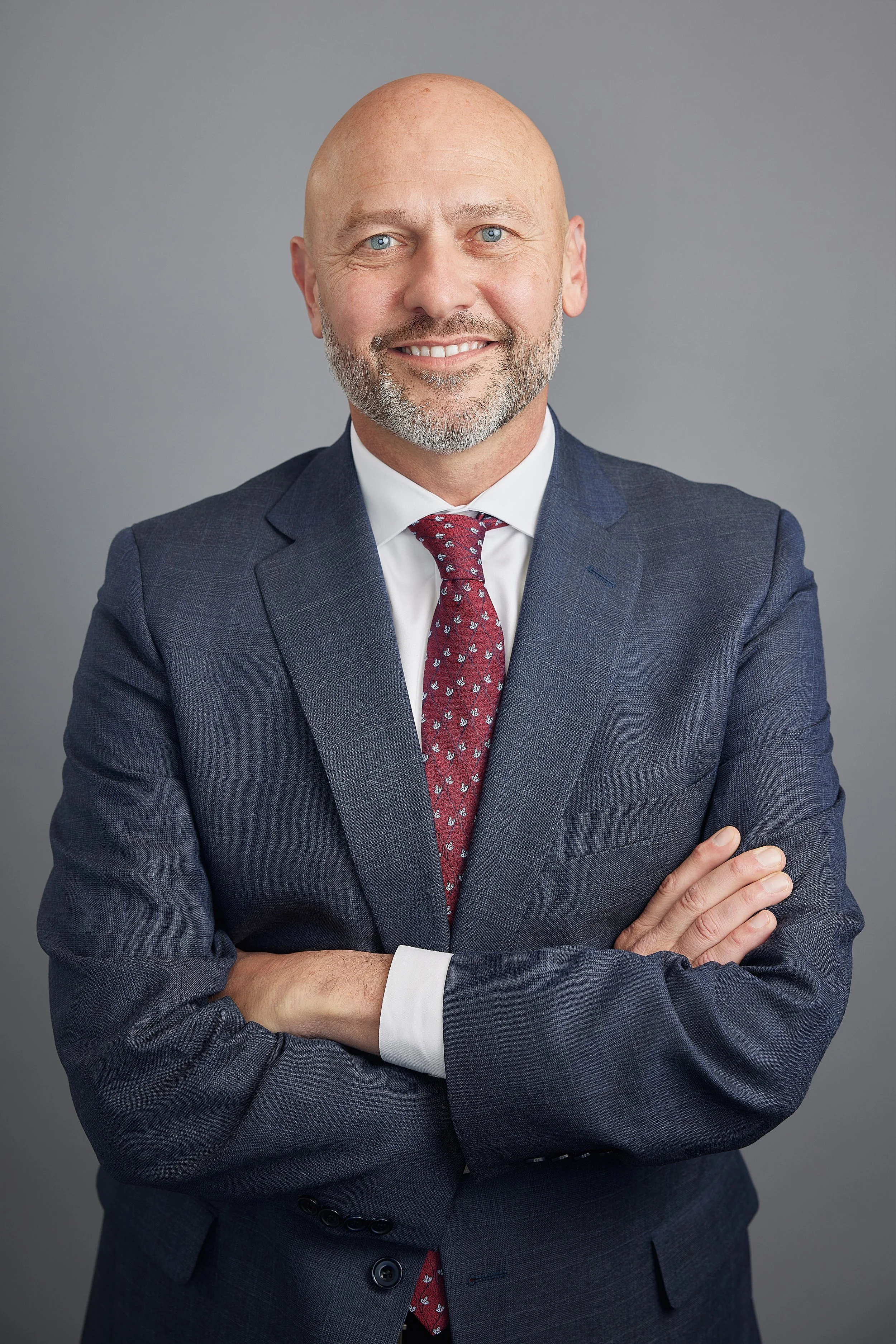 A professional headshot photographed for a Law Firm based in New Braunfels, TX to be used in print, web and on a billboard.