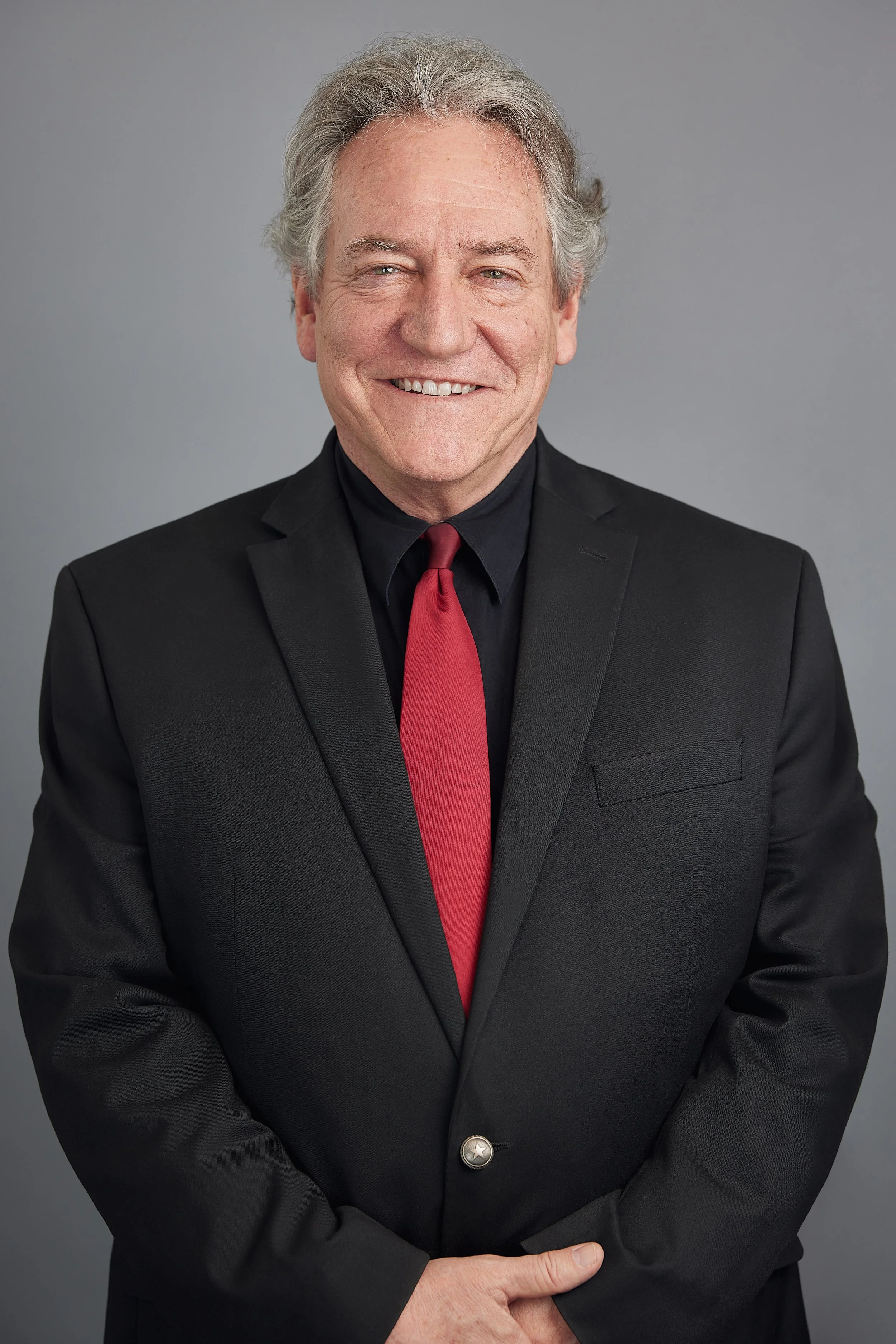 A professional headshot photographed for a Law Firm based in New Braunfels, TX to be used in print, web and on a billboard.
